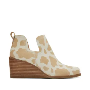 Kallie Wedge Bootie in Cow Print