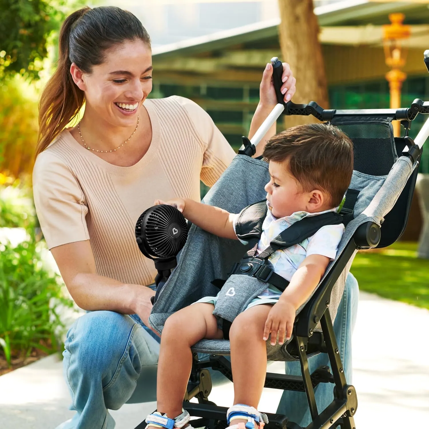 Munchkin Stroller Fan - Portable Fan for Travel, Baby Gear Accessory with 4 Speeds, Flexible Clip-on Leg Attachment, Rechargeable Battery, Black with Multicolored LED Lights